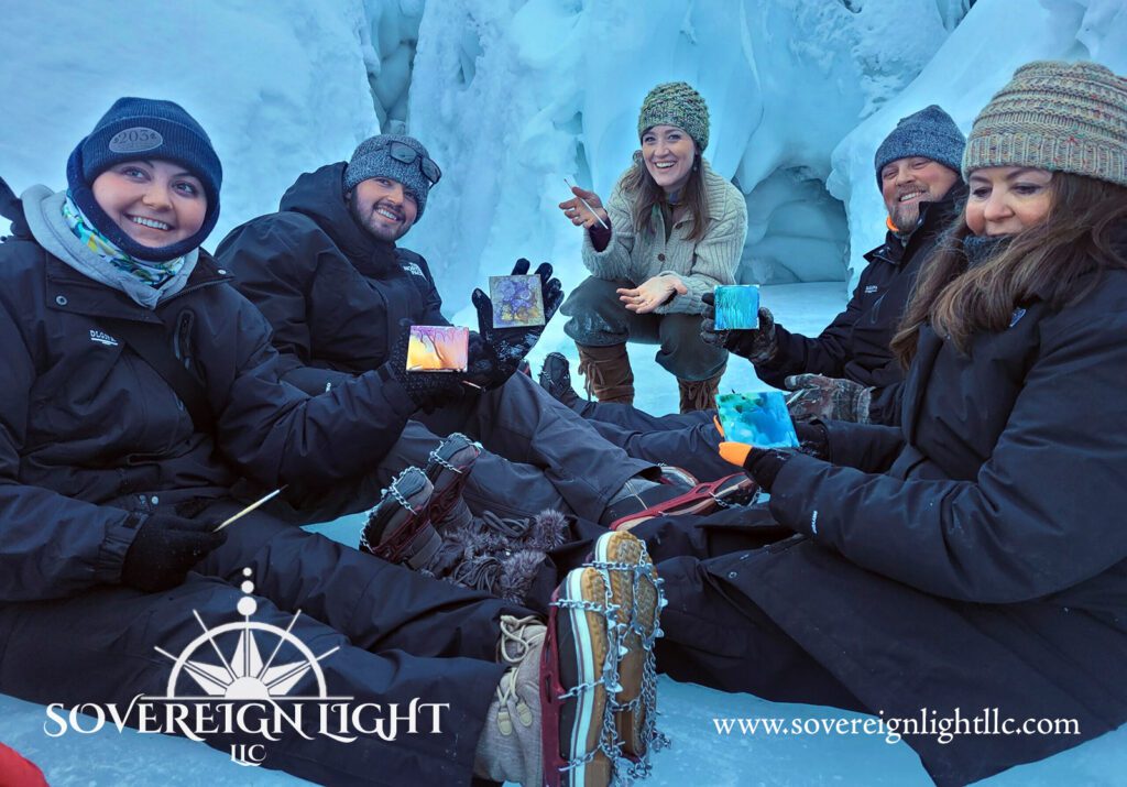Guests display their personal art created on Matanuska Glacier, an optional activity during Alaska corporate retreats.
